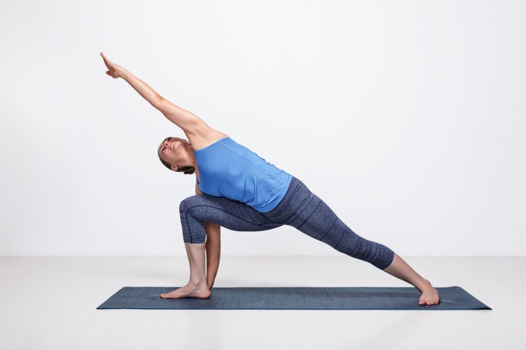 Woman doing Ashtanga Vinyasa Yoga asana