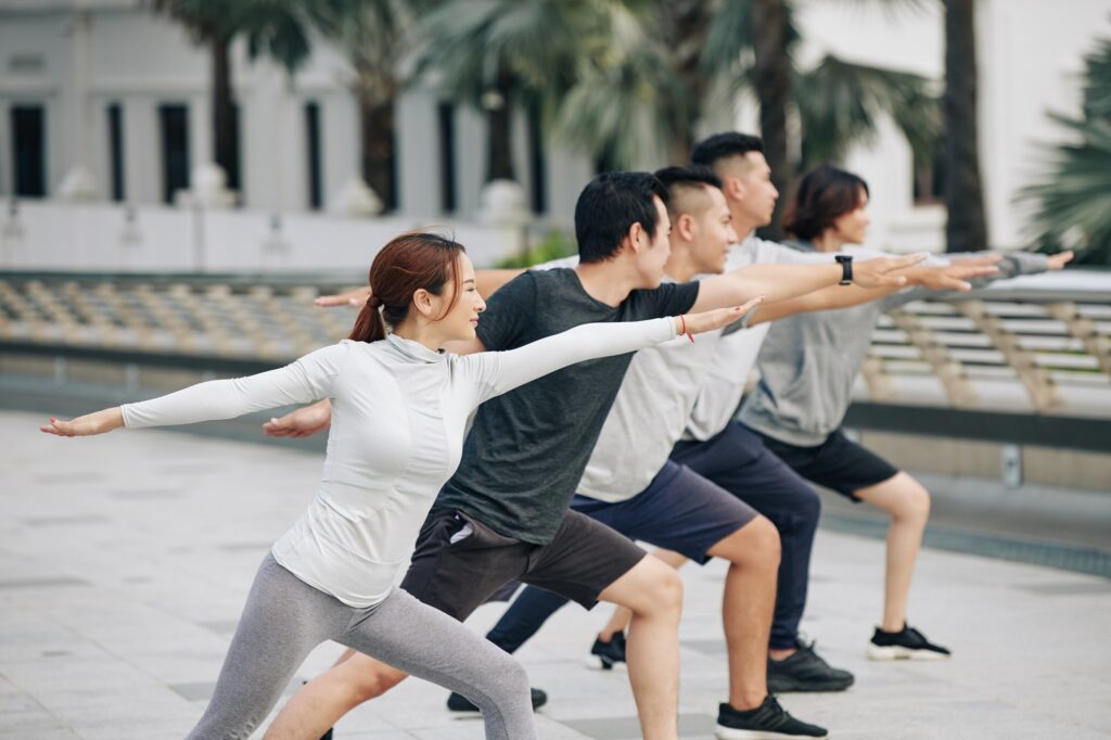 Young people practicing yoga